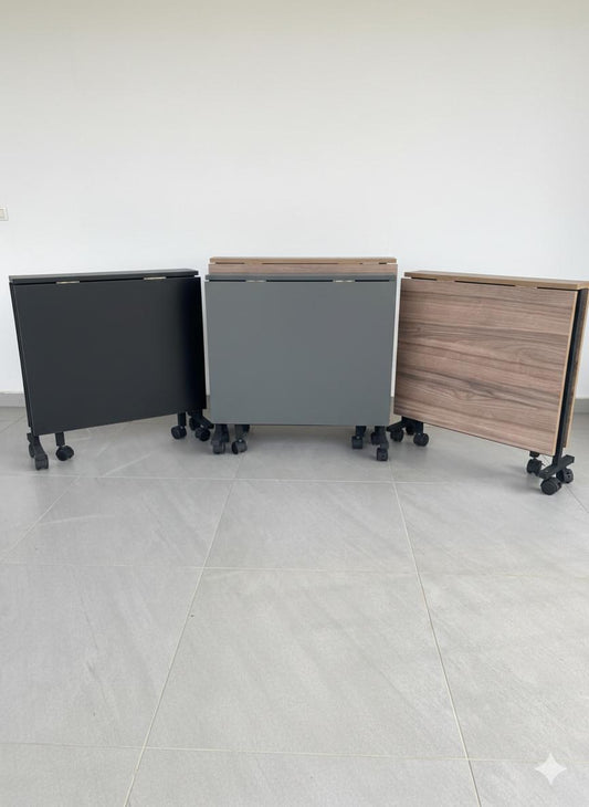 طاولة متحركة تفتح على الميلتين